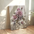 Cottage roses art leaning on a floor