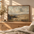 Sheep landscape print above a bed