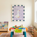 Silly goose art above colorful toy storage