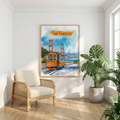 Golden Gate Bridge art print beside a rattan armchair and leafy plant