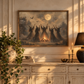 Witches gathering print above a cream cabinet