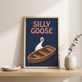 Goose rowboat art leaning on a floor