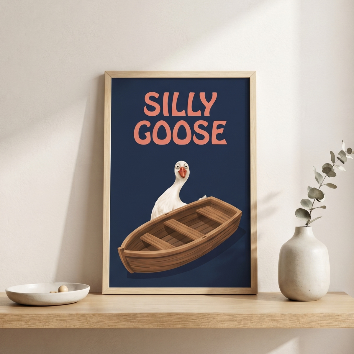 Goose rowboat art leaning on a floor