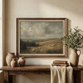 Countryside art above a console