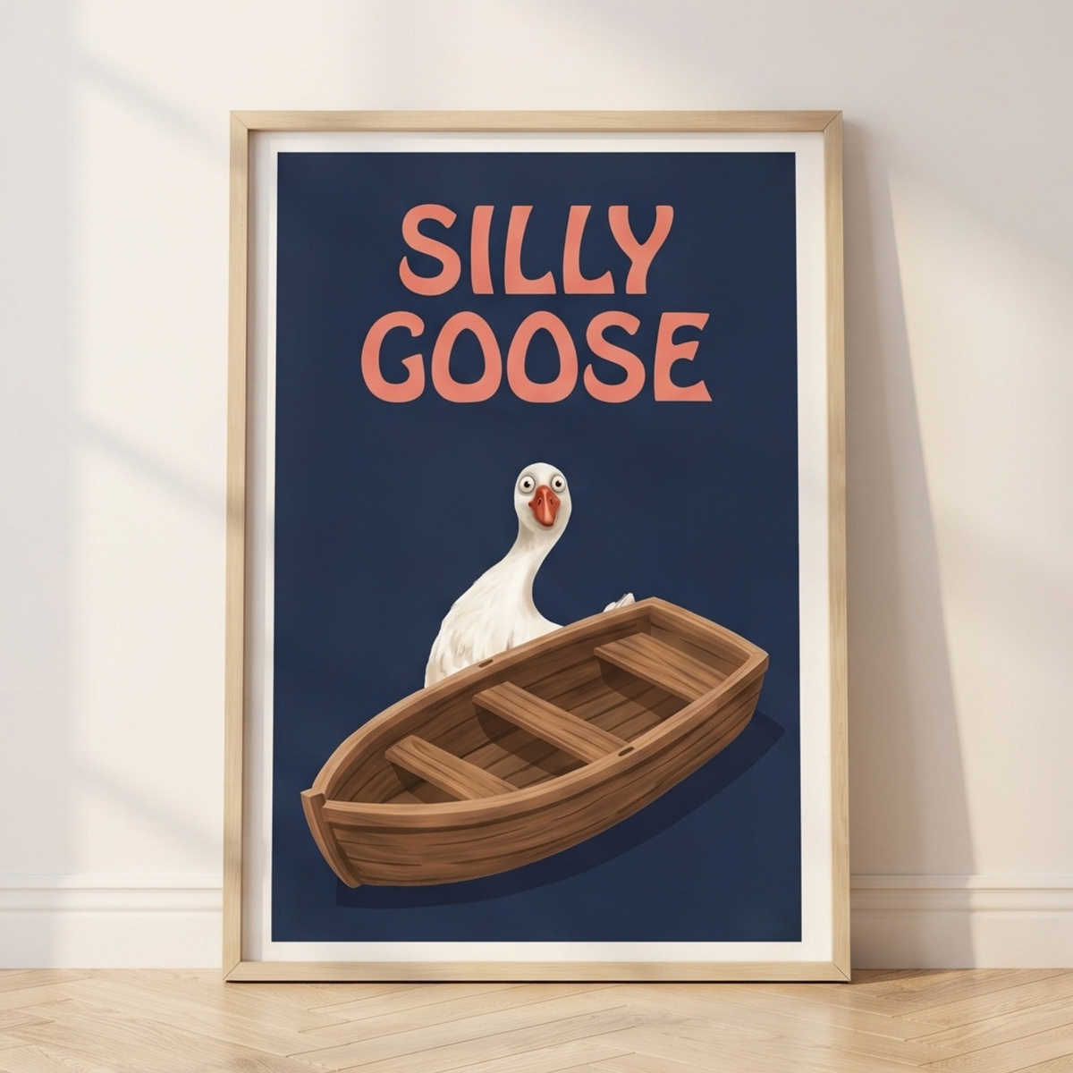Vintage nursery art of a white goose sitting in a wooden rowboat on navy with the words Silly Goose in pink